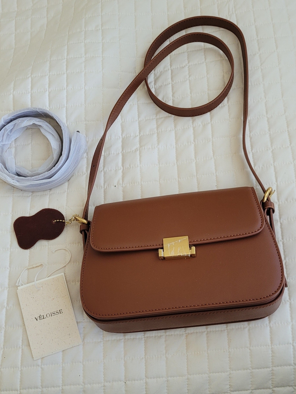 Véloisse Brown Leatherette Crossbody Bag with Gold Lock